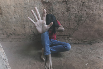 Teenage girl making stop gesture.violence and abuse concept.