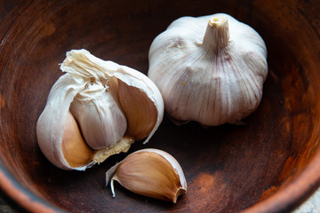 Peeled Garlic close-up shot on vintage background