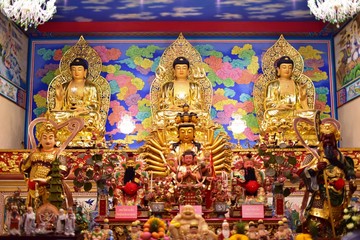 Fototapeta premium Golden statue of buddha in temple, Thailand 