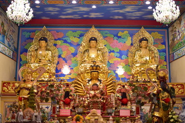 Fototapeta premium Golden statue of buddha in temple, Thailand 