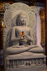 Golden statue of buddha in temple, Thailand	
