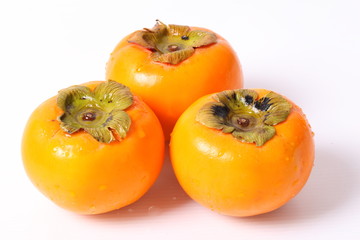 Persimmon fruit isolated on white background