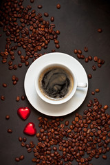 Valentine day greeting card with  coffee cup and hearts  sweet candies