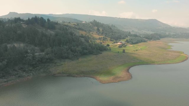 Aerial panning shot over Tomin&eacute; reservoir in Colombia