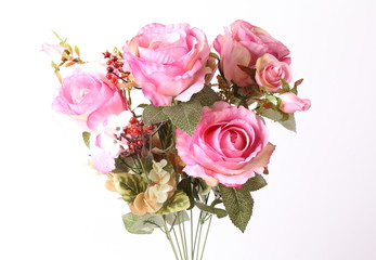 Bouquet of beautiful pink roses on white background