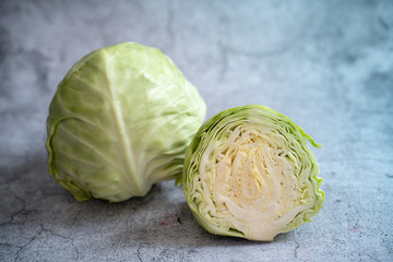 Fototapeta premium Chinese cabbage, white cabbage, cabbages and cut cabbage on mable stone.