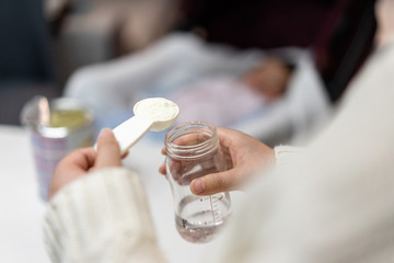 prepairing milk formula for feeding baby