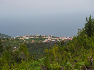 Fototapeta na wymiar Aerial view on village Los Sauces, San Andres y Sauces at the end of hiking trail to Los Tilos bosque at beautiful nature reserve on La Palma, Canary islands, Spain