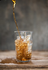 sparkling water splashing on grey background.