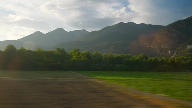 zurich to vienna train road trip summer sunset time side pov window panorama 4k austria