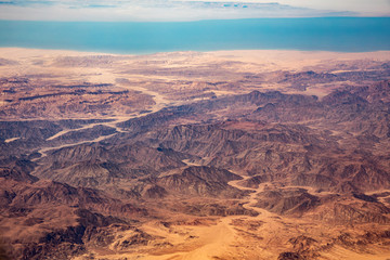 Aerial view of mountains in the Sinai through an airplane window