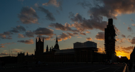 Fototapeta na wymiar Beautiful red sunset behind the Palace of Westminster, House of Parliament and Big Ben, London, England