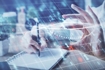 Forex chart displayed on woman's hand taking notes background. Concept of research. Multi exposure