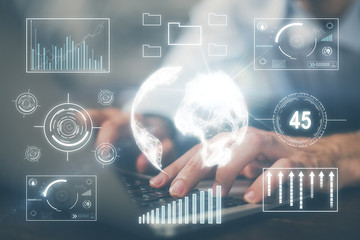 Forex graph with businessman working on computer in office on background. Concept of hardworking. Multi exposure.