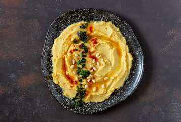 Hummus on a rusty background. Pete. Recipes. Vegetarian food. Healthy eating.