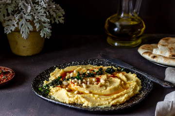 Hummus on a rusty background. Pete. Recipes. Vegetarian food. Healthy eating.