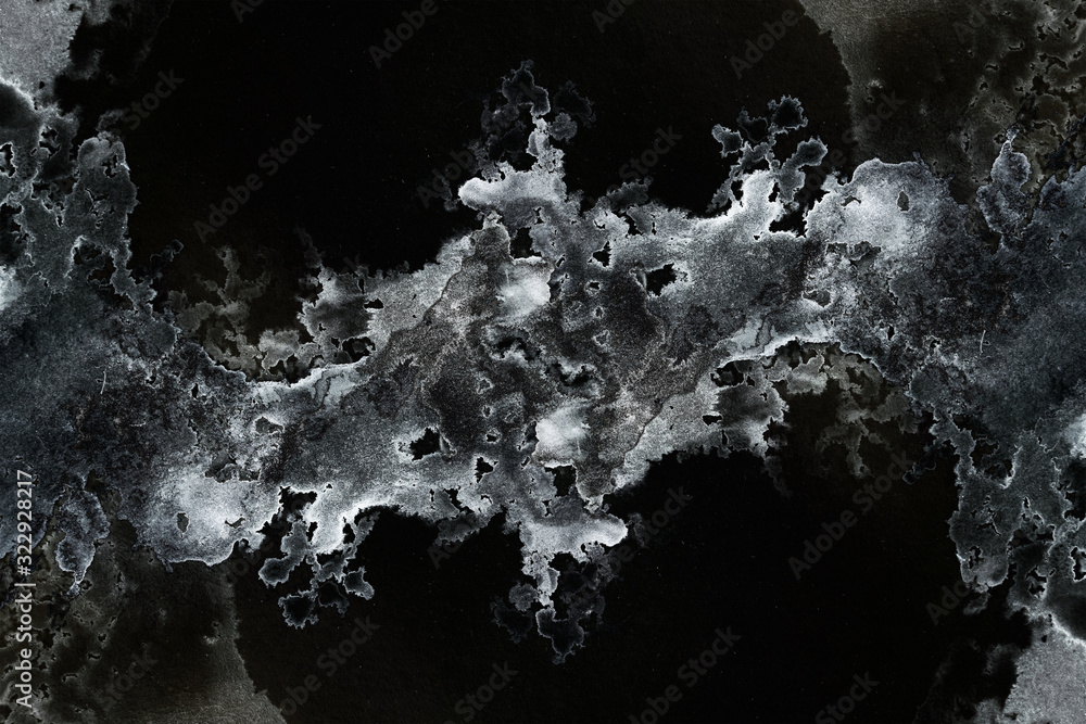 Poster abstract splashes on black background. monochrome image.