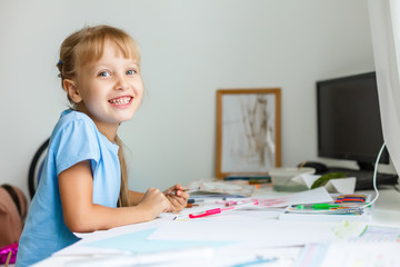 education, creation and school concept - smiling little student girl drawing and daydreaming at school