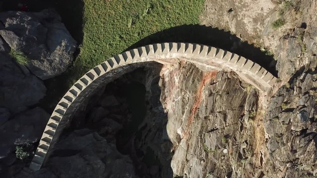 4K aerial drone summer day video of African savanna, Stengel water dam surrounded by bushy hills, Daan Viljoen National Reserve, Khomas Hochland area near Windhoek, Namibia's capital, southern Africa