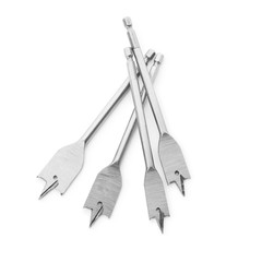 Spade drill bits isolated on white, top view. Carpenter's tools