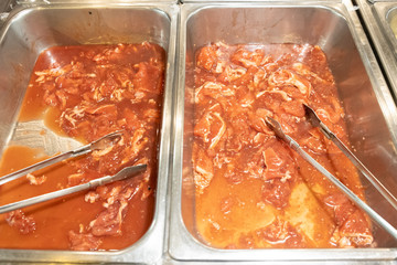 Raw food for grill or boiled at self service at Thai style BBQ buffet