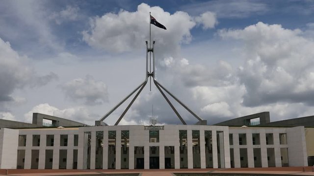 Facade and entrance to the federal parliament building open for public in national capital city of Australia.