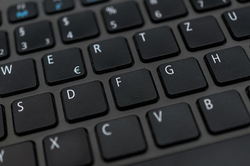Photo macro digital keyboard computer for business on the dark and little light