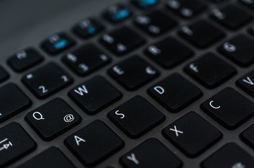 Photo macro digital keyboard computer for business on the dark and little light