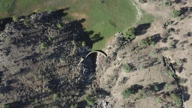 4K aerial drone summer day video of African savanna, Stengel water dam surrounded by bushy hills, Daan Viljoen National Reserve, Khomas Hochland area near Windhoek, Namibia's capital, southern Africa