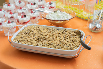 A bowl of delicious crumble dessert