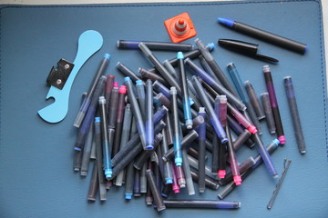 Pen inks hand writing signature and can opener 