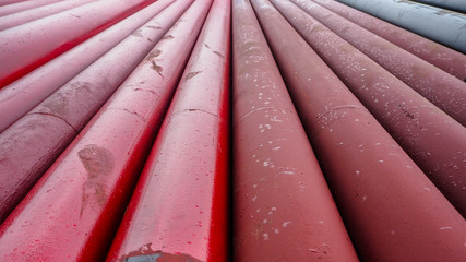 Black steel pipe painted in red for fire production system in the factory