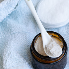 Hygiene bath product. Body, face scrub on towel. Wellness therapy regeneration
