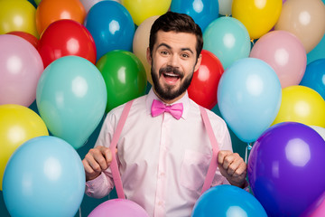 Fototapeta na wymiar Photo of funny handsome guy different colors ready for birthday party playful festive mood wear pink shirt bow tie suspenders on balloons creative background