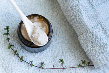 Hygiene bath product. Body, face scrub on towel. Wellness therapy regeneration