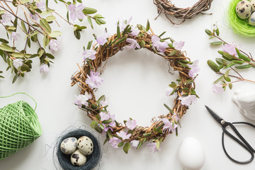 Spring wreath with flowers on light. Creative flat lay. Decor handmade. © svetlana_cherruty