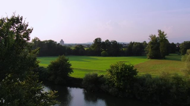 Drone view of a beautiful river coast in the middle of the forest