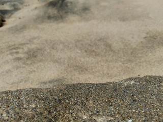 Fototapeta na wymiar Sand and the rock natural background