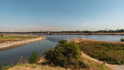 Fototapeta na wymiar View over the River Rhine from Duisburg-Homberg to Duisburg-Laar, North Rhine-Westfalia, Germany