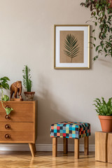 Vintage interior design of living room with design retro stool and commode, plants, cacti, wooden...