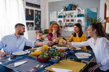 making a toast, family vegetarian food diner party