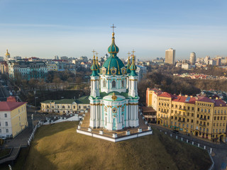 Fototapeta na wymiar Aerial drone view. St. Andrew's Church in Kiev in early spring on a sunny day.