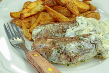 andouillettes grillées et pommes de terre 