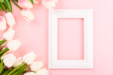 Happy Women's Day, Mother's Day concept. top view flat lay Tulip flower and photo frame