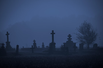 Graveyard in fog