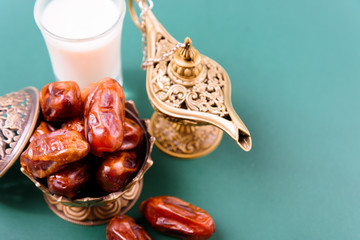 Ramadan, Dates in golden bowl, Milk, arabian Aladdin golden lamp vintage style
