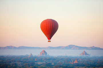 Hot air balloons fly over Bagan temples