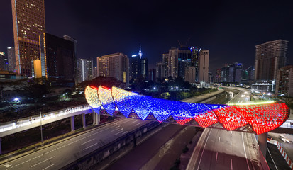 new attraction at kuala lumpur, saloma link bridge lit at night aerial view