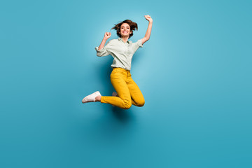 Full body photo of funky pretty lady jumping high up celebrating weekend vacation start wear casual...