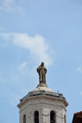 tower of cathedral with statue in Valladolid Spain